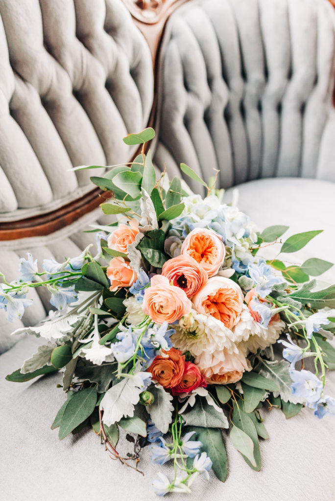 bridal bouquet on couch