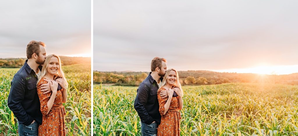 couple snuggling in a corn field at sunset