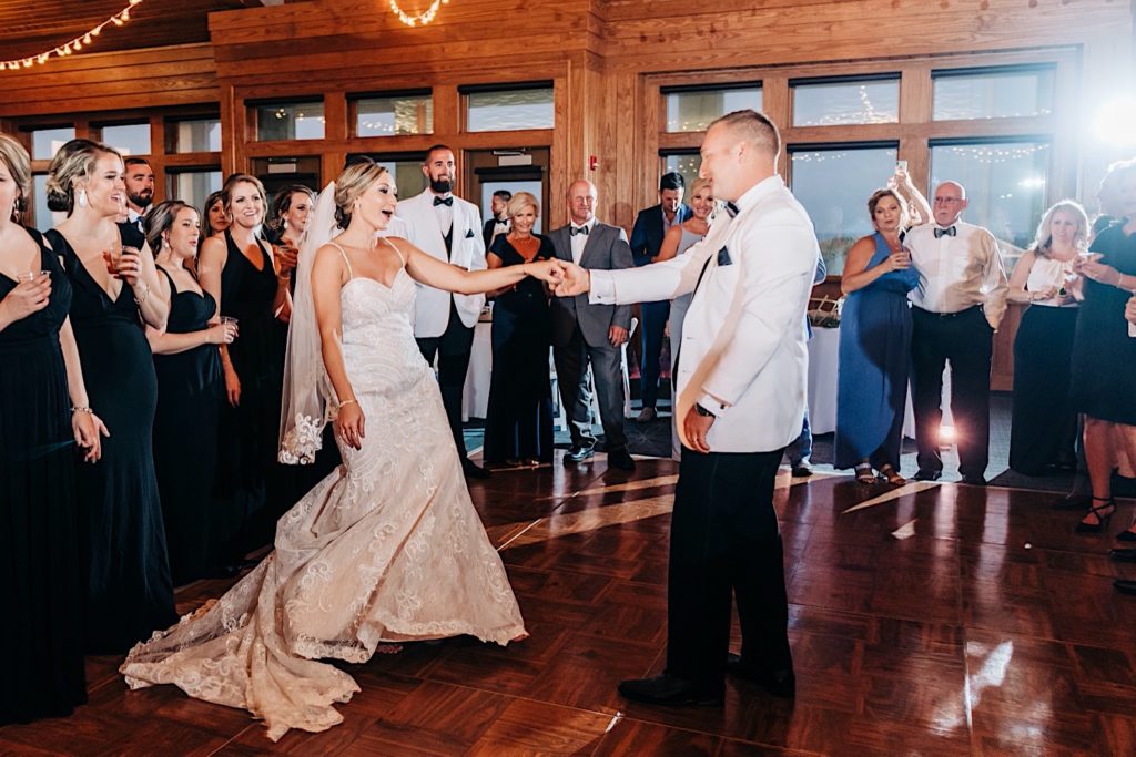 bride and groom first dance at Jennette's Pier