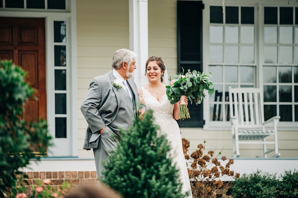 emotional bride with dad