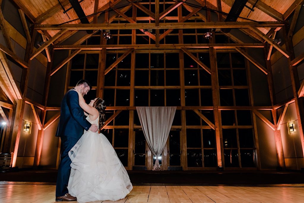 bride and groom first dance at welch allyn lodge
