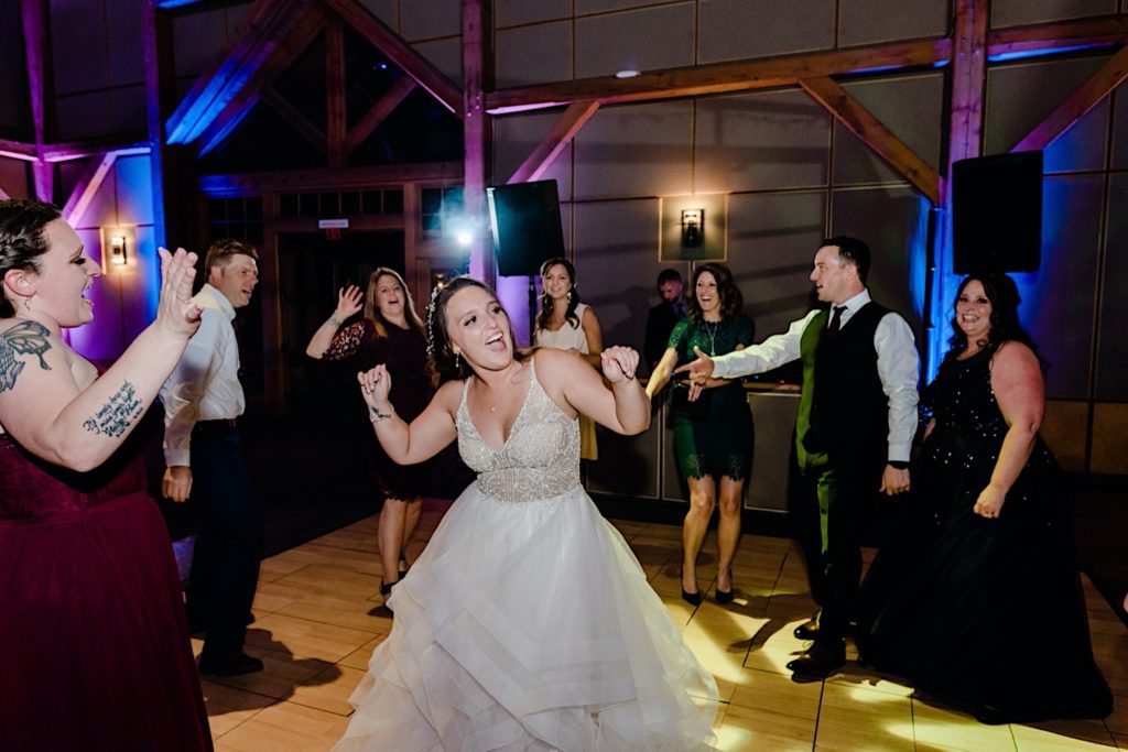 bride dancing at Lodget at welch allyn wedding reception
