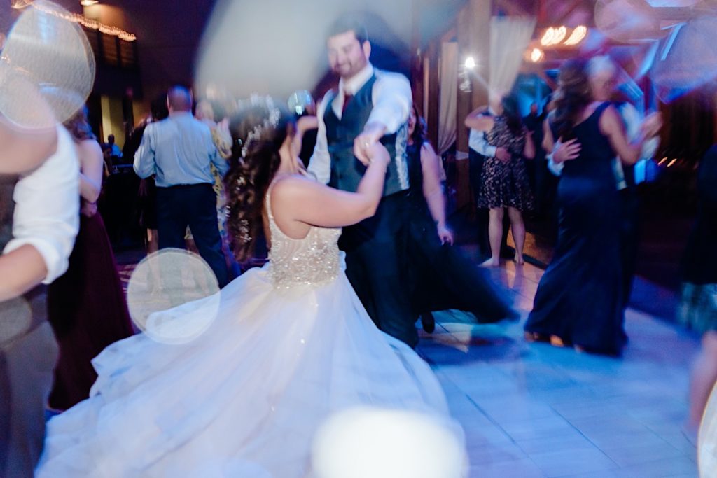 Guests dancing at Lodget at welch allyn wedding reception