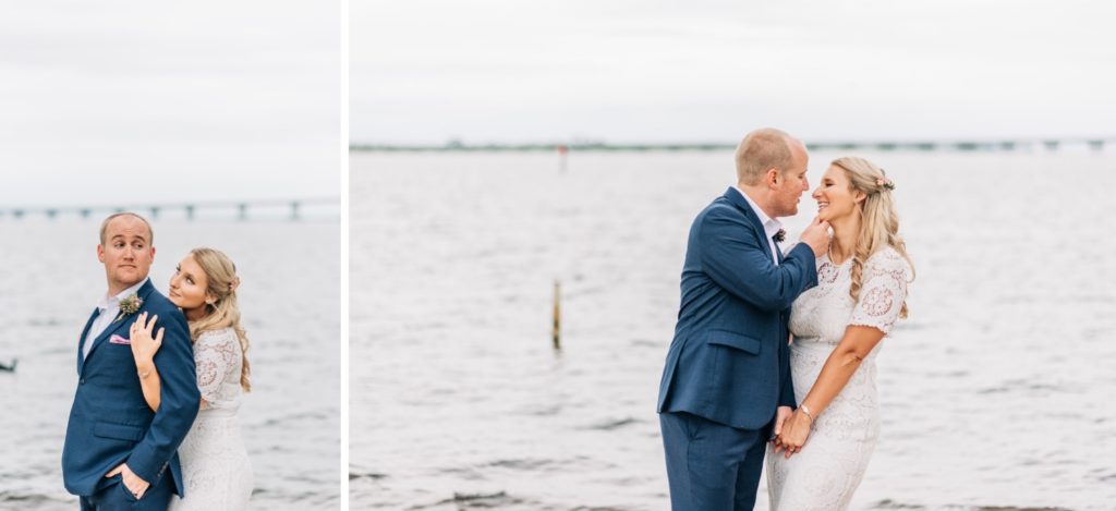 Bride and groom kissing next to the water in New Bern NC