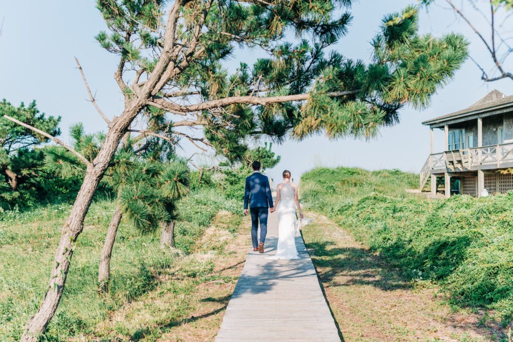 Bride and Groom walking to Outer banks Wedding 