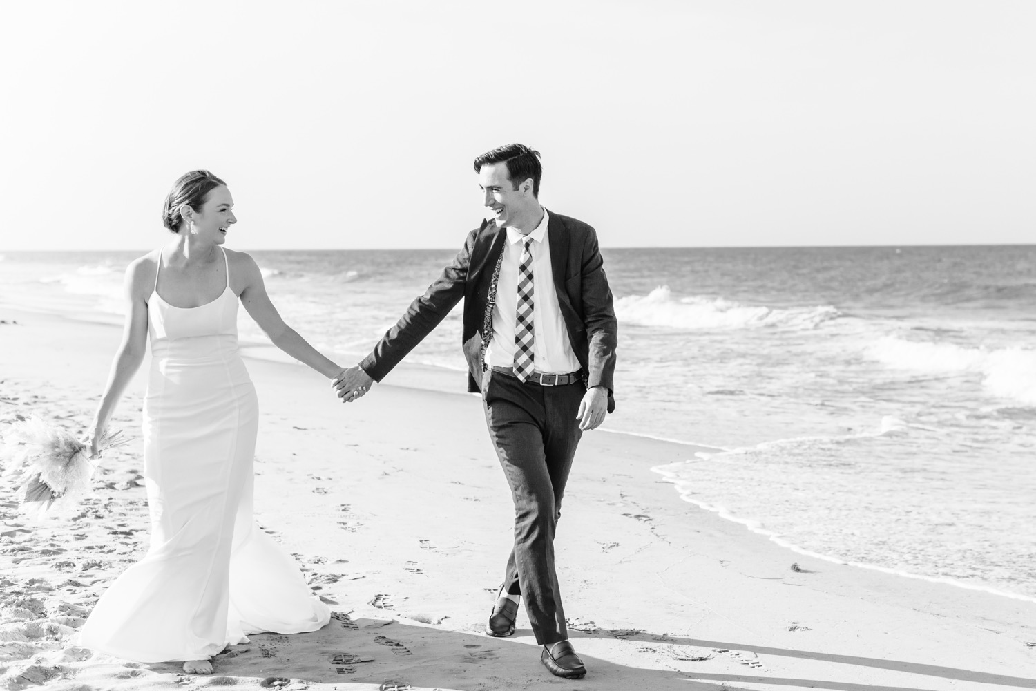 Bride and groom on the beach at outer banks intimate wedding