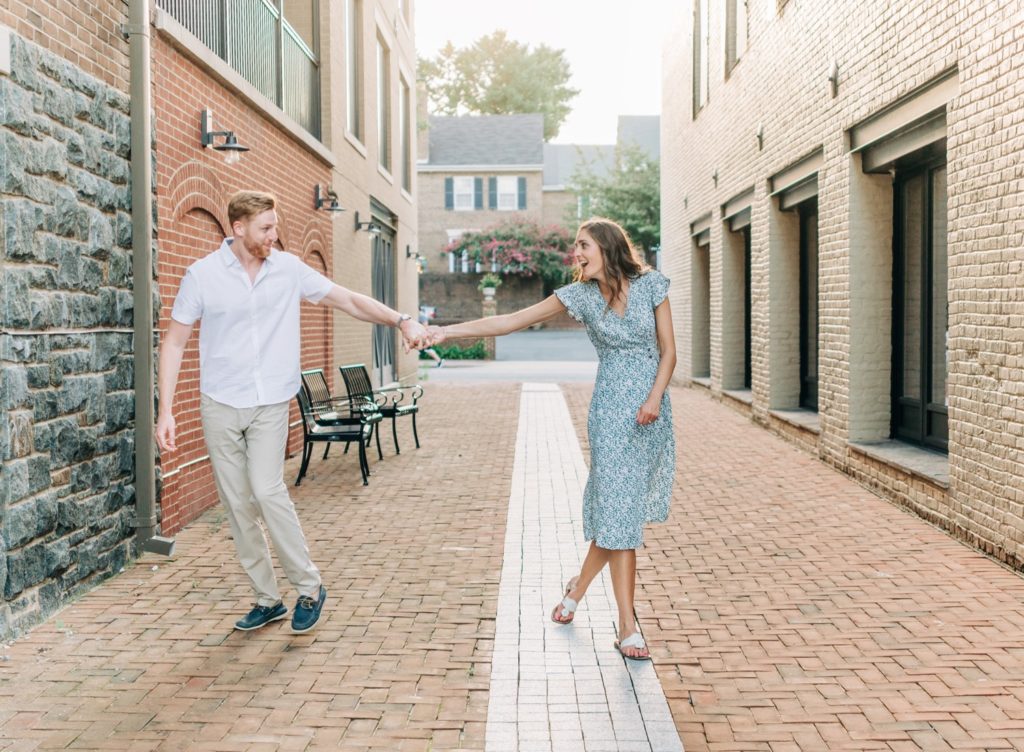 Couple dancing in alley in Old Town Alexandria
