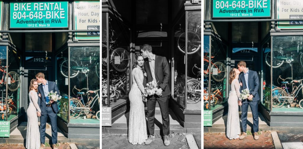 Bride and groom embracing outside of bike shop in Richmond, VA