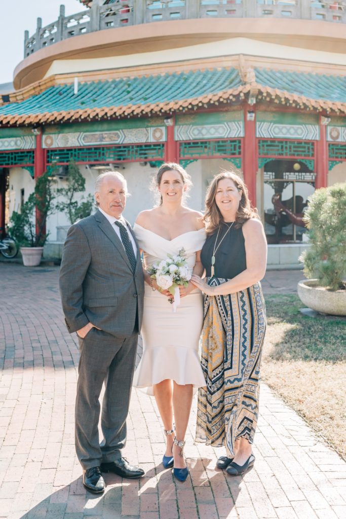 Bride with her mother and father after elopement ceremony in Norfolk, VA