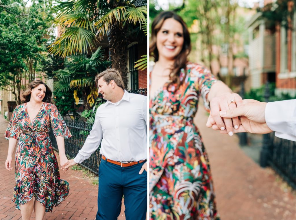 Couple posing together hand in hand for engagement portraits