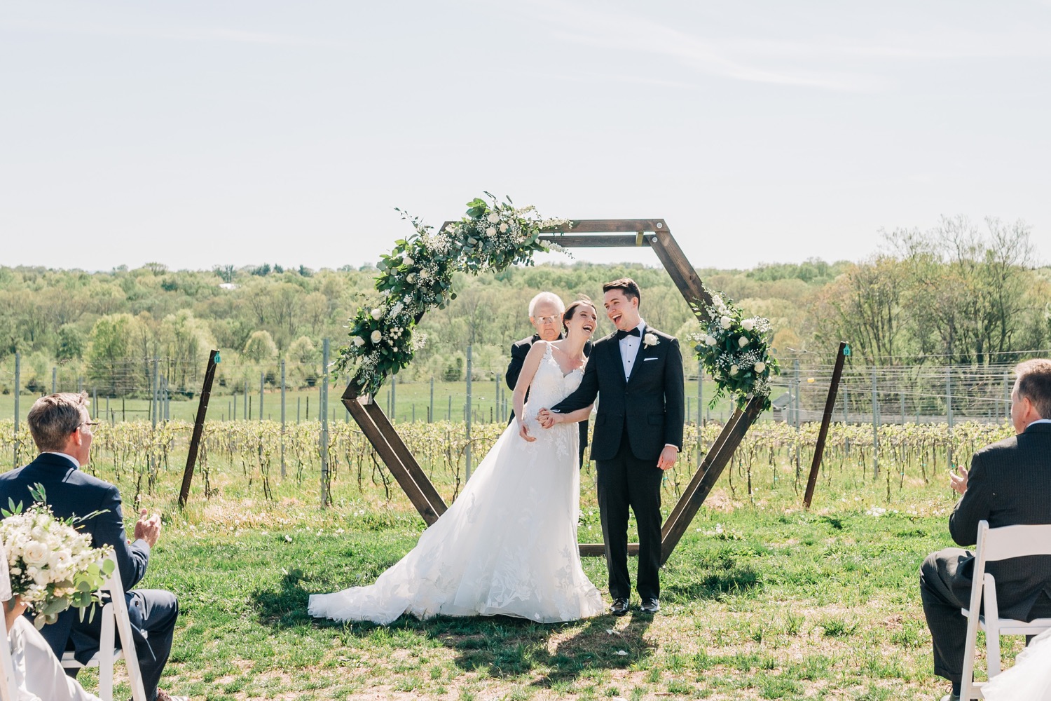 bride and groom after ceremony at windridge vineyards