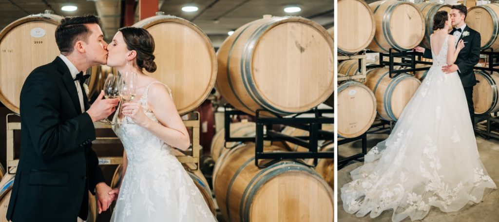 bride and groom kissing infant of wine barrels at Windridge Vineyards