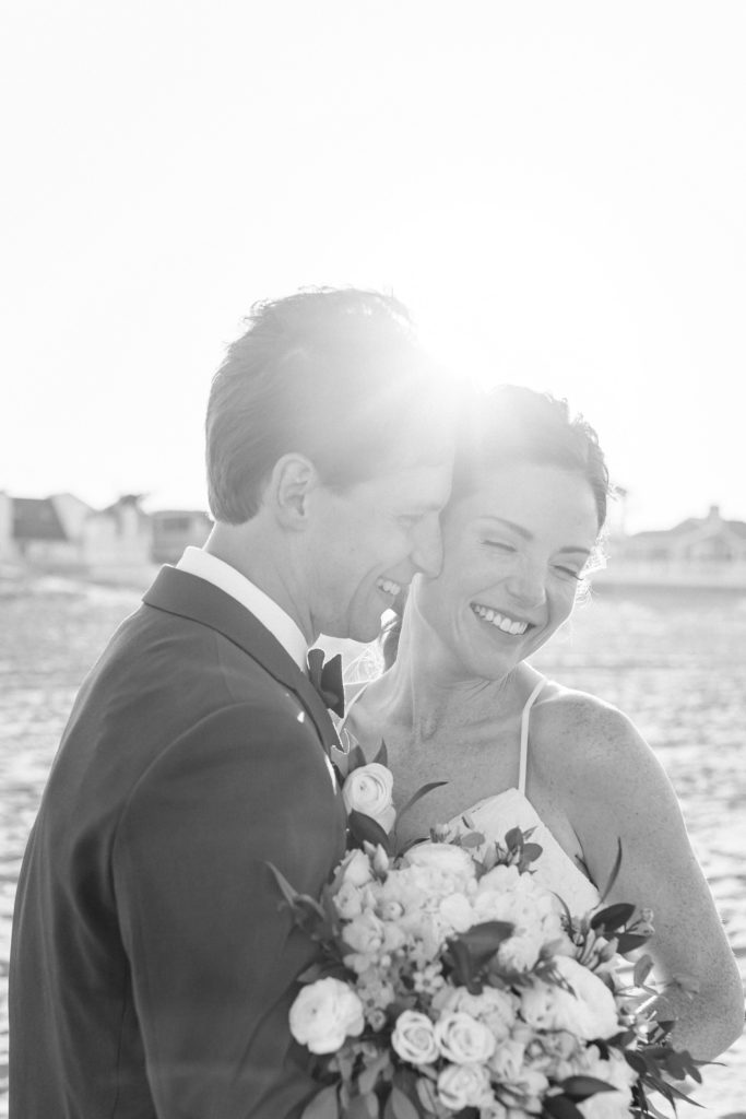 Black and white sunset photo of couple after Virginia Beach elopement