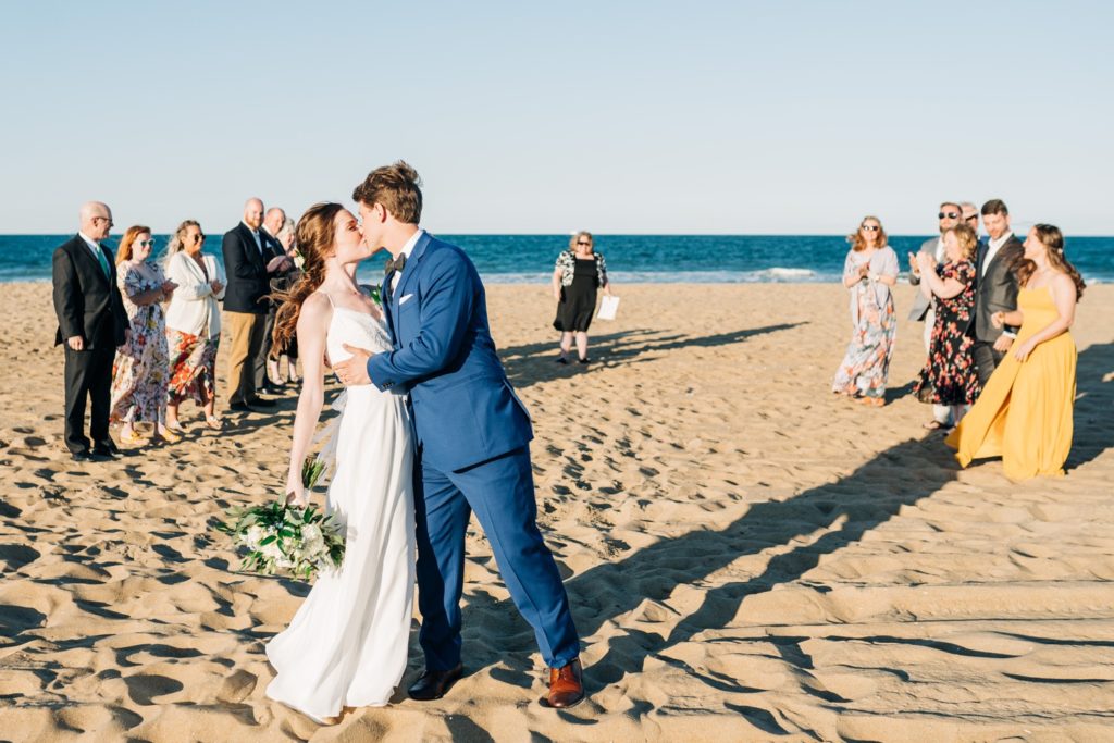 Bride and groom kissing at their Virginia Beach elopement