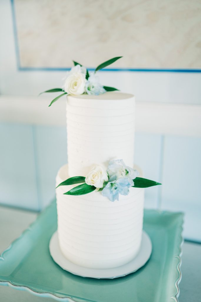 White wedding cake with flower details