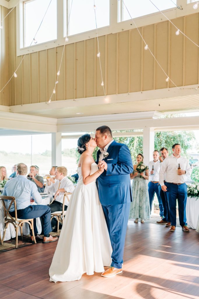 Bride and groom on dance floor sharing their first dance at Currituck Country Club wedding