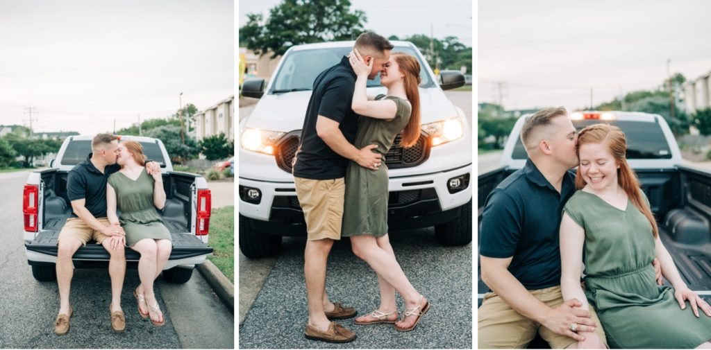 Couple posing with their white pickup truck for engagement photos