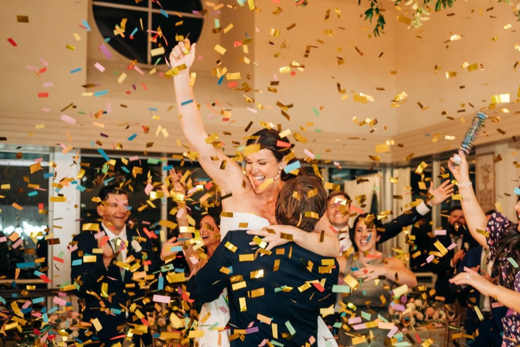 Bride excited as confetti falls 