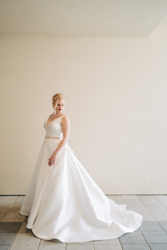 Bride standing in elegant gown