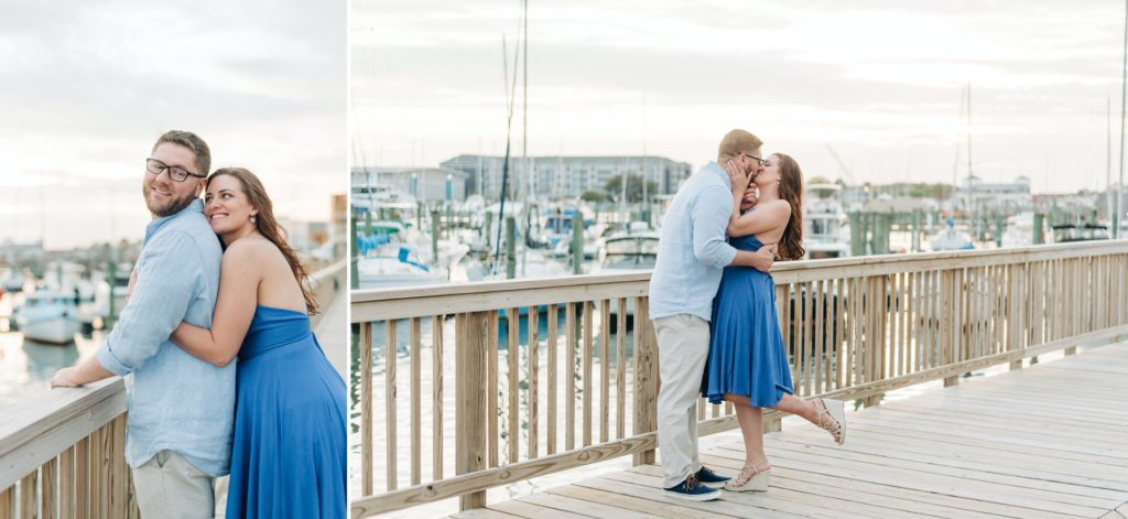 Girl in blue dress hugging her fiancé from behind on a beach pier. Couple kissing each other on the beach pier in Virginia