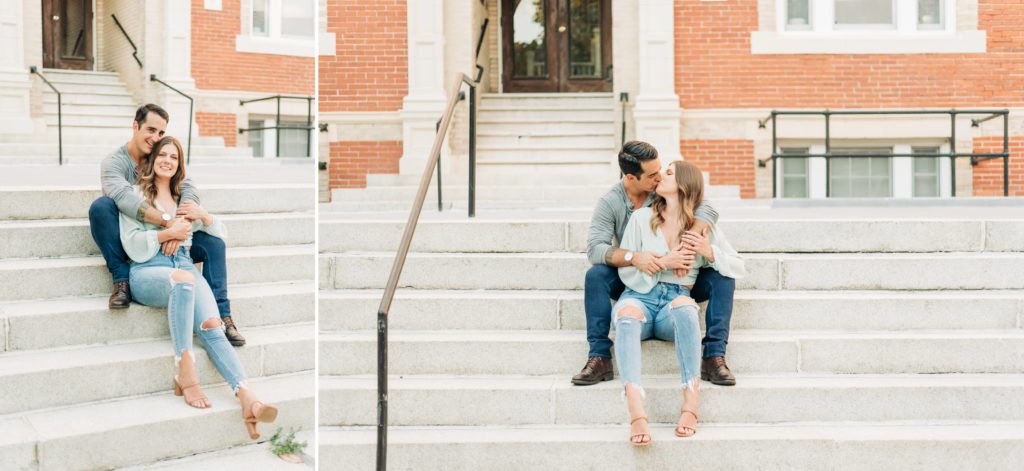 engaged couple sitting on courthouse stairs kissing during their Downtown Norfolk Engagement