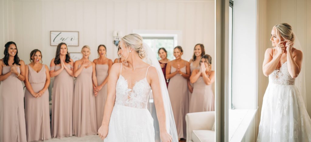 Bride revealing her dress to bridesmaids