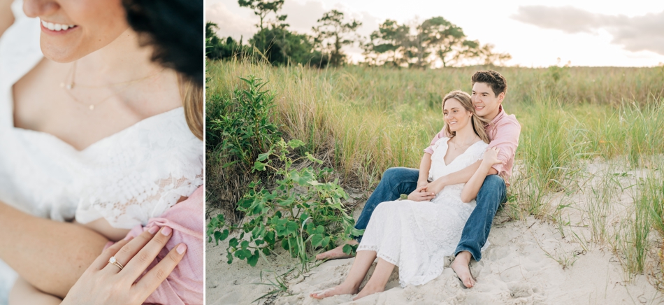 couple in grassy dunes during engagement photos