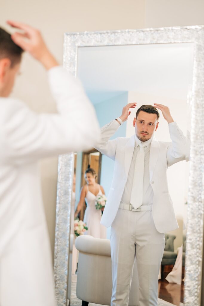 Groom getting ready at glass hill venue