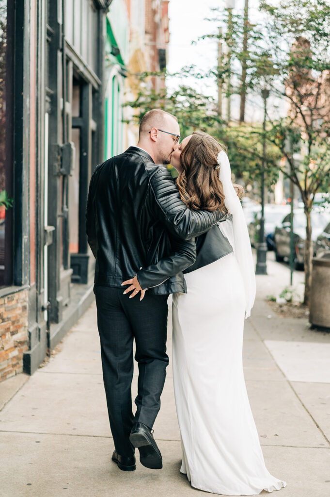 Bride and groom in leather jackets