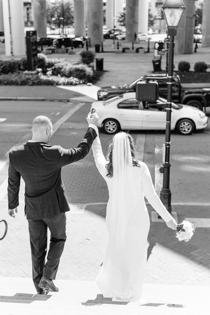 bride and groom outside main street station in richmond