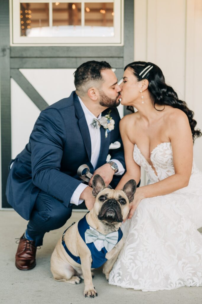 Bride and groom with Frenchie