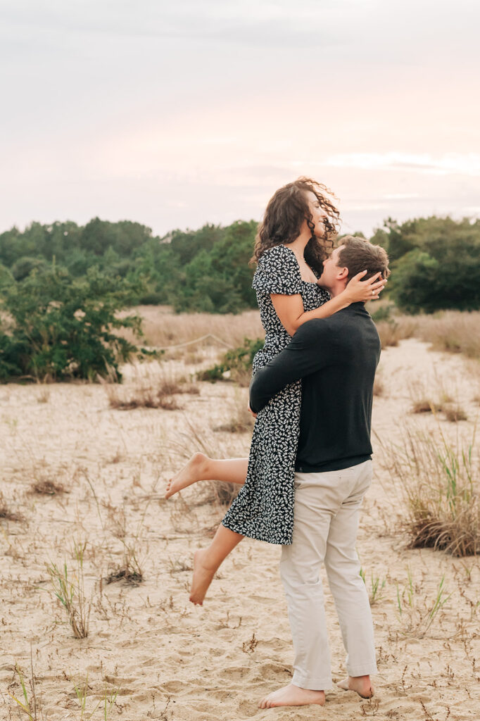 couple at sunset engagement photos at Pleasure House Point