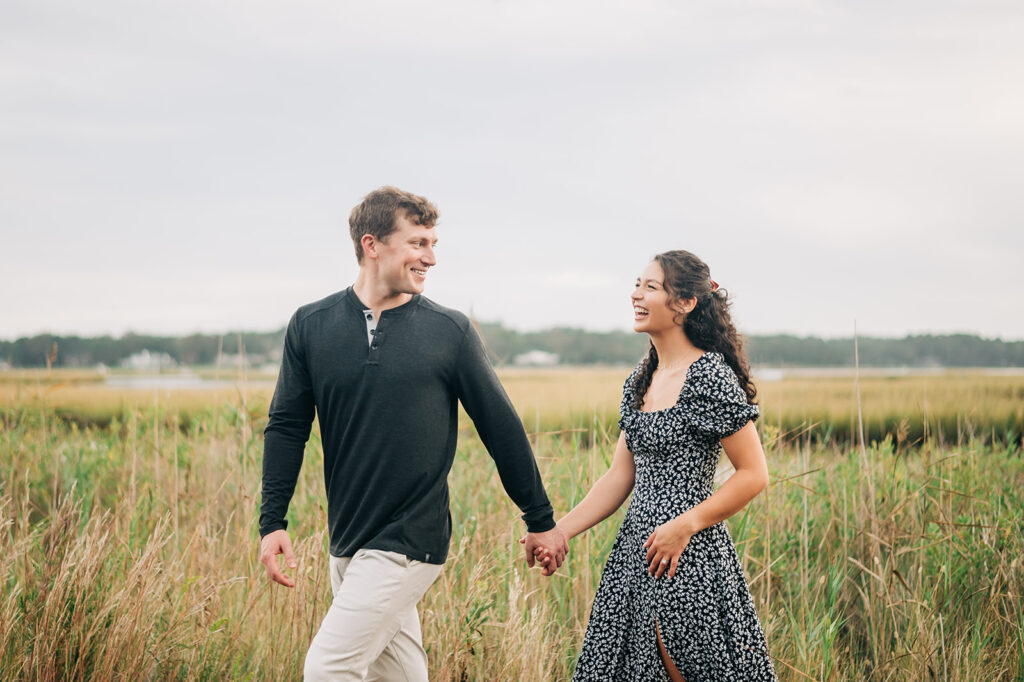 couple walking at Pleasure House Point