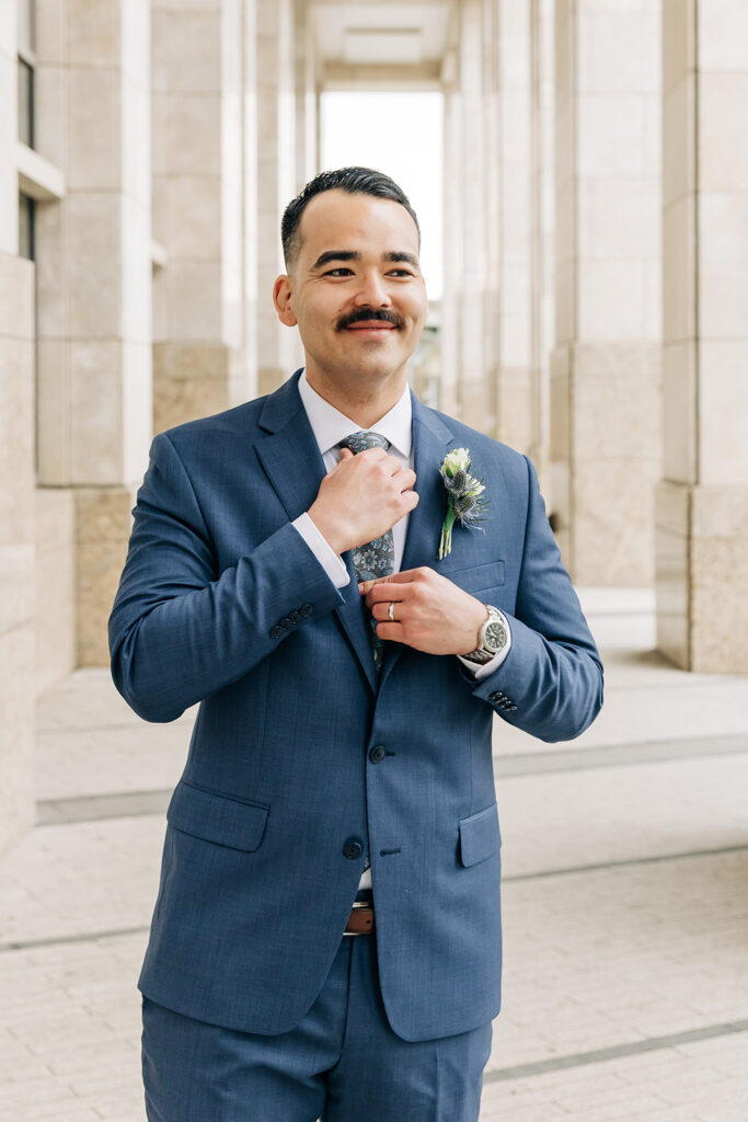 Groom outside Norfolk VA Courthouse