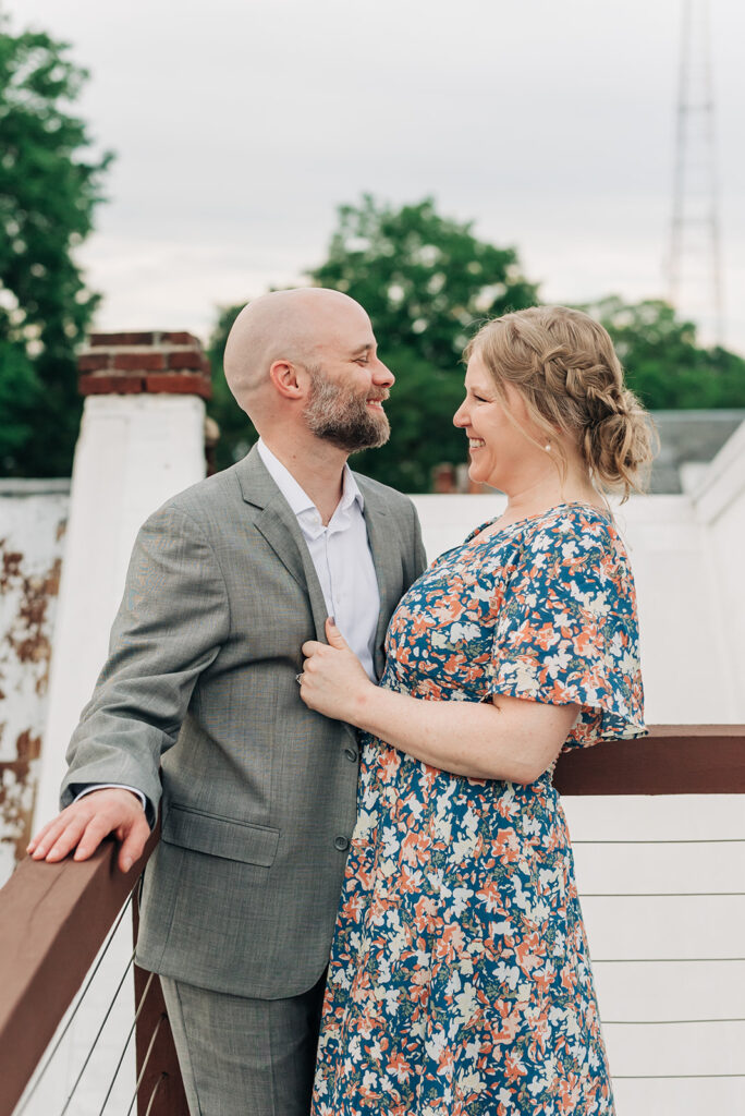 Couple smiling on rooftop