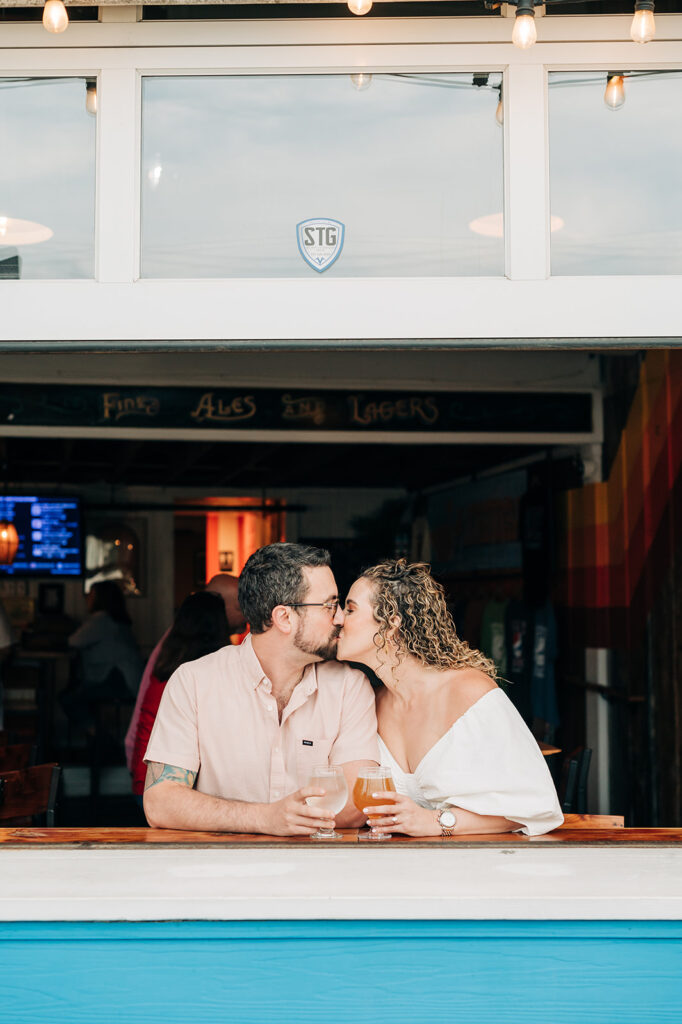 Couple Cheersing and celebrating after a proposal