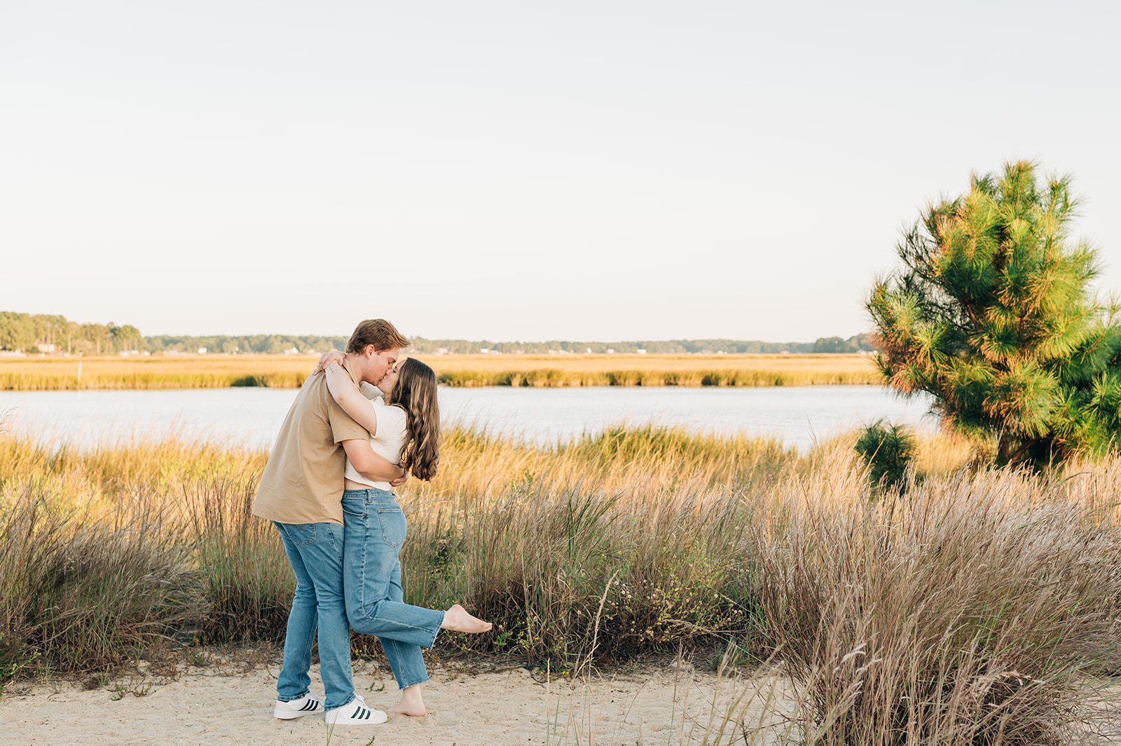 Couple kissing after getting engaged