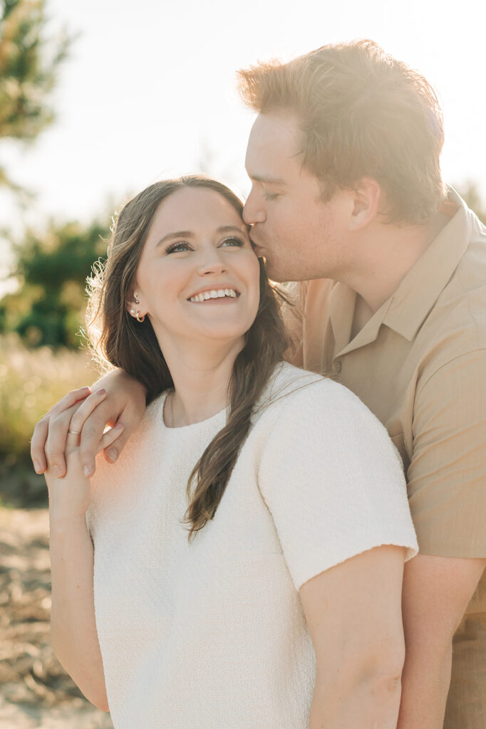 Couple kissing on the cheek