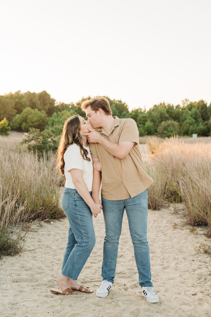 Couple kissing at Engagement