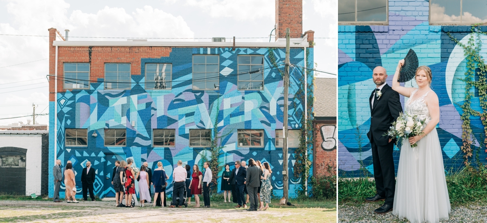 Bride fans herself in front of fan district mural, guests gather for wedding