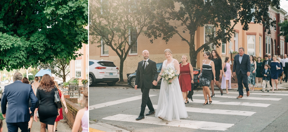 Wedding guests and couple walk to restaurant for Richmond wedding