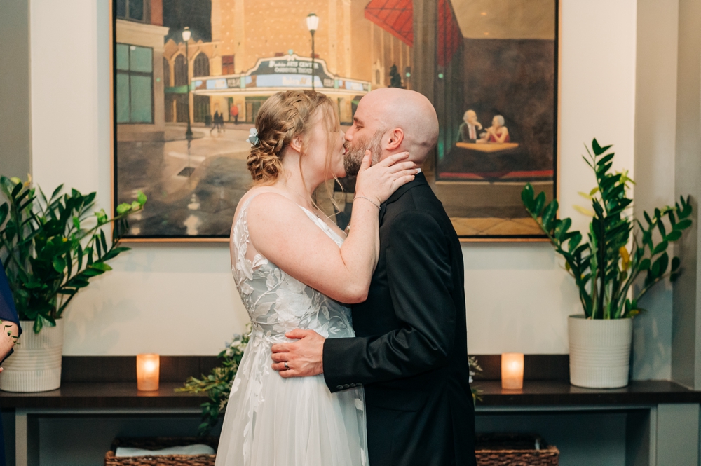 Couple kissing after getting married at The Heritage