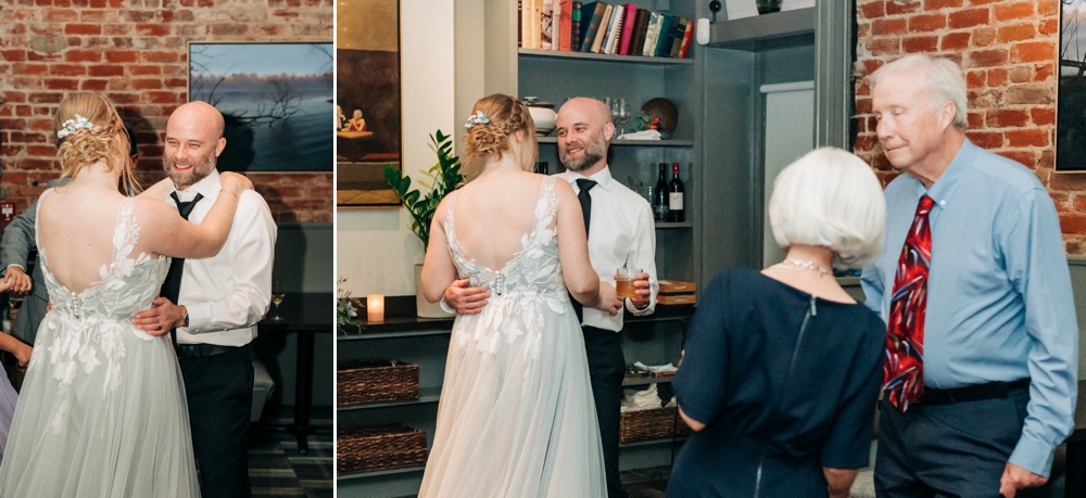 Groom smiling as he shares a dance with his bride