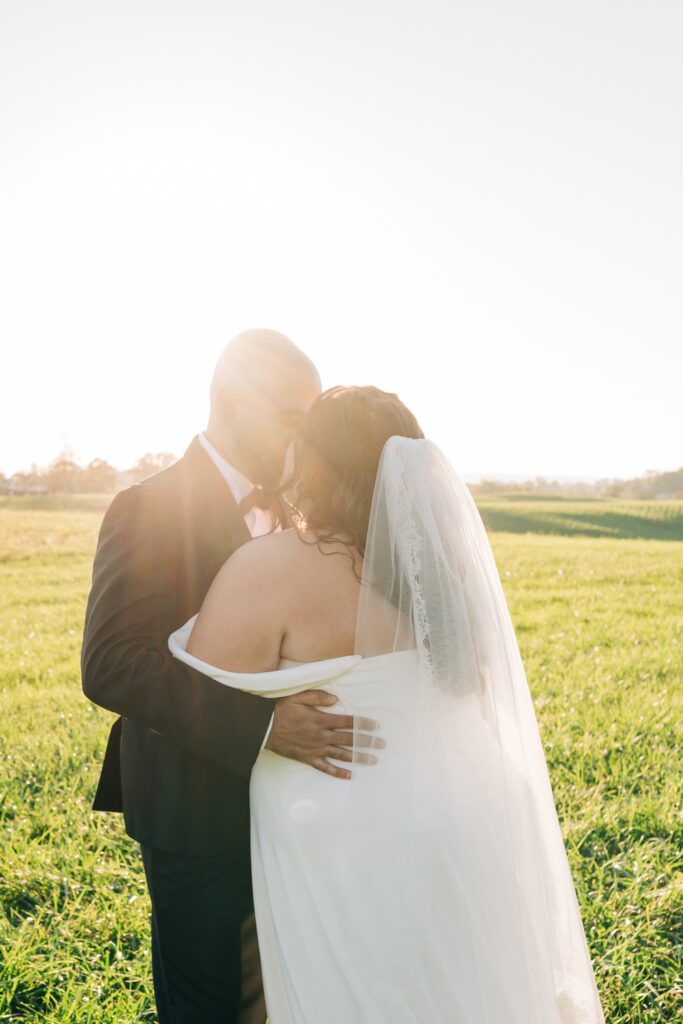 Bride and groom at sunset