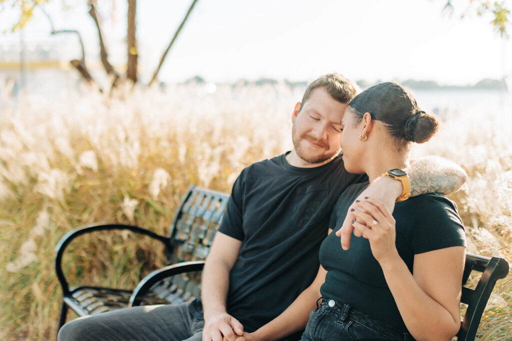 Couple sitting on bench in Norfolk