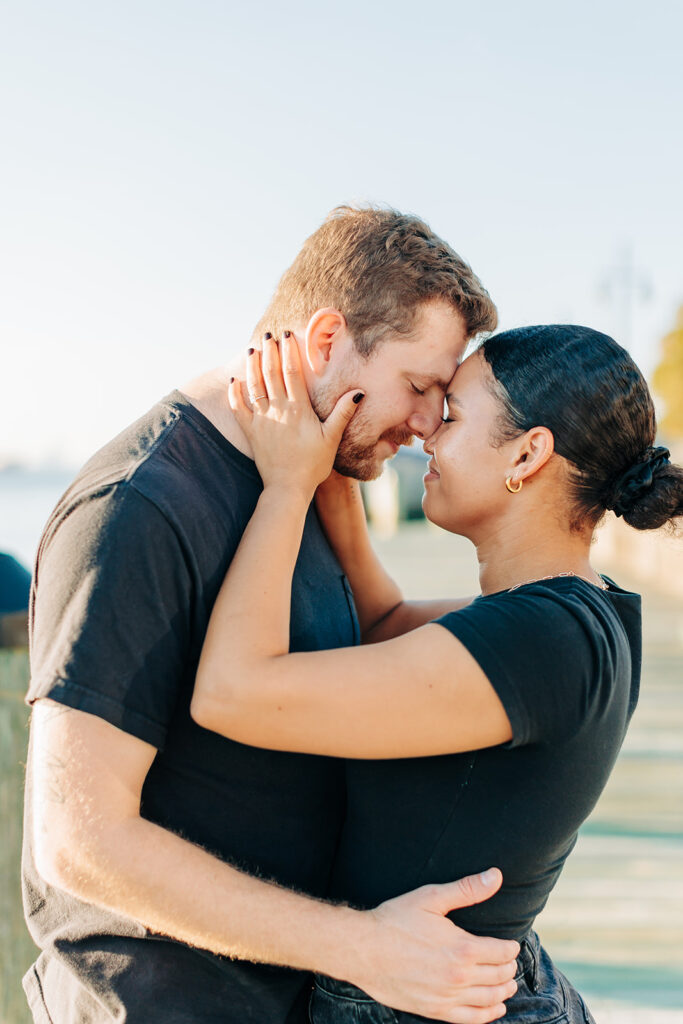 Couple embracing in Norfolk waterside