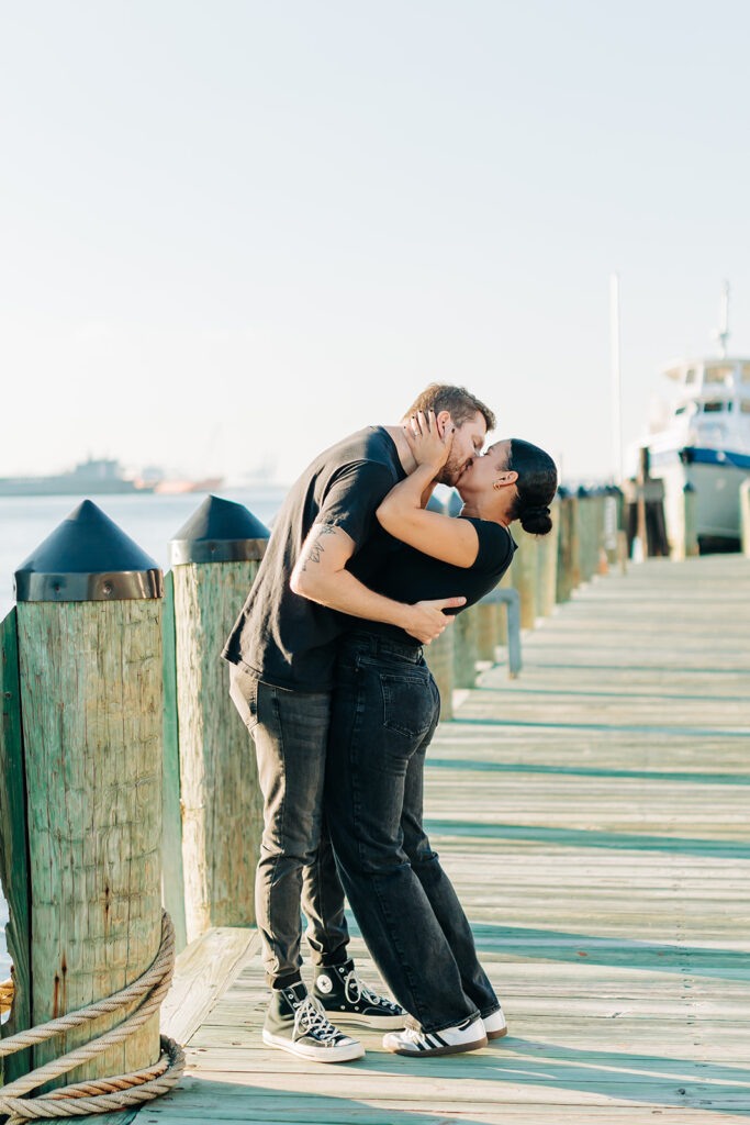 Couple kissing on the dock