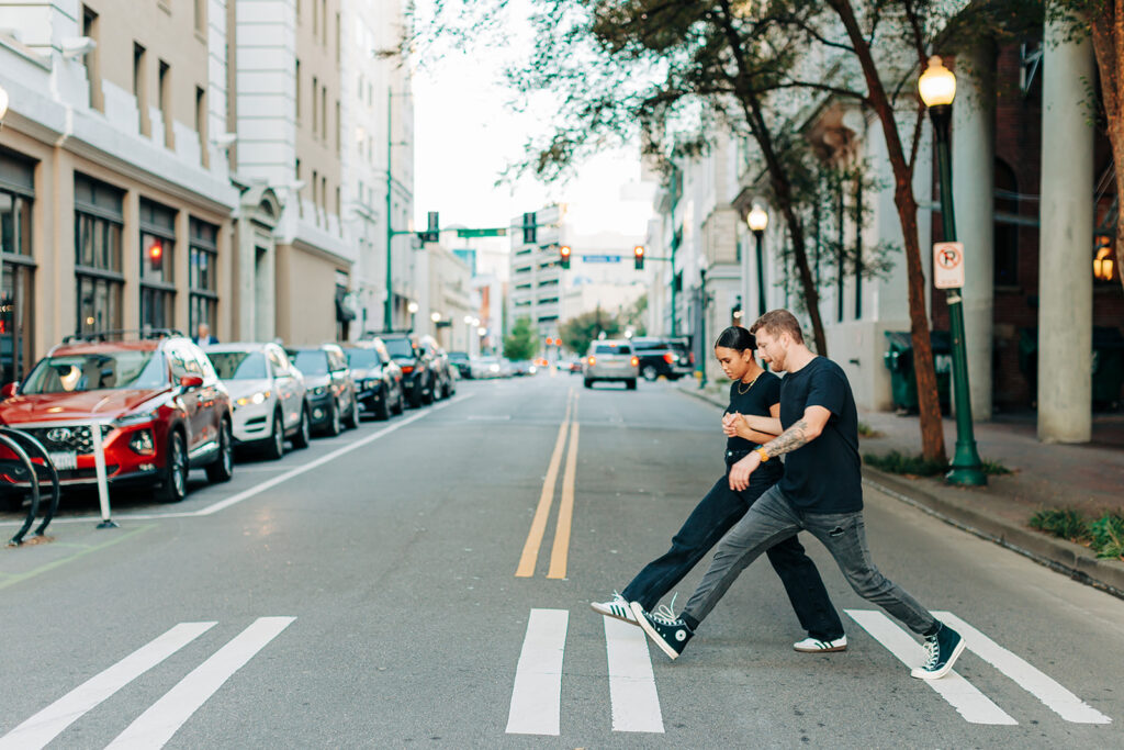 Couple crossing the street in Norfolk 