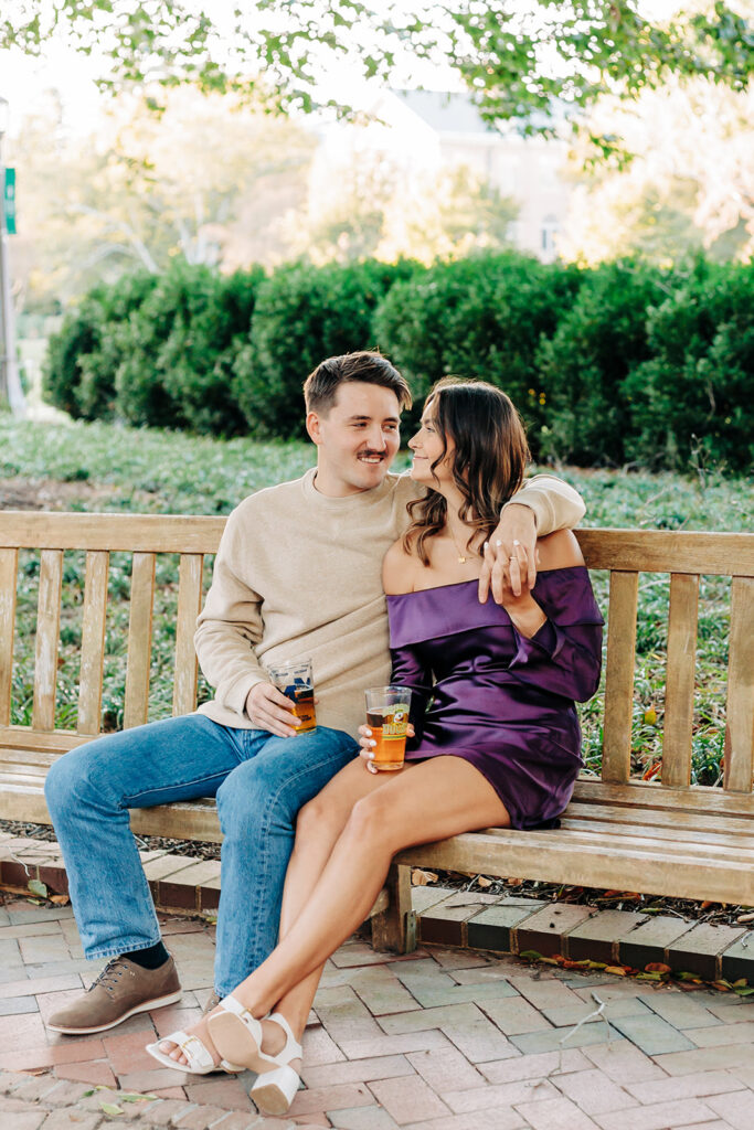 couple cuddling on a bench