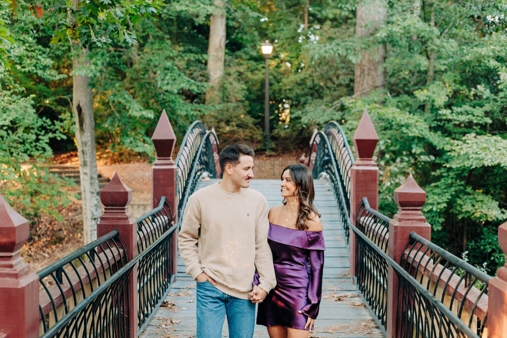 couple walking over bridge